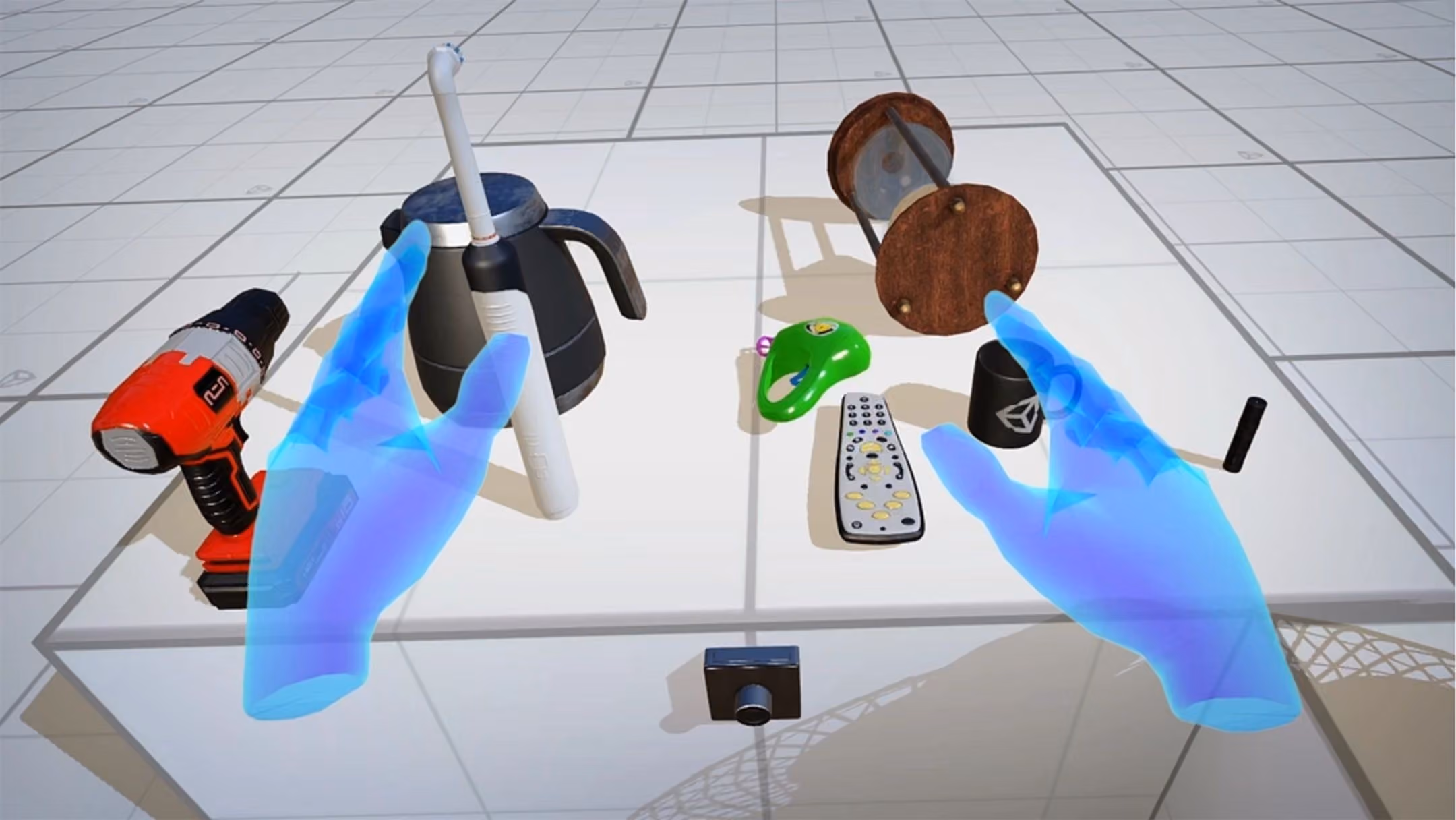 Click to enlarge image Translucent blue virtual hands above a table of everyday objects in a Unity XR interaction scene.