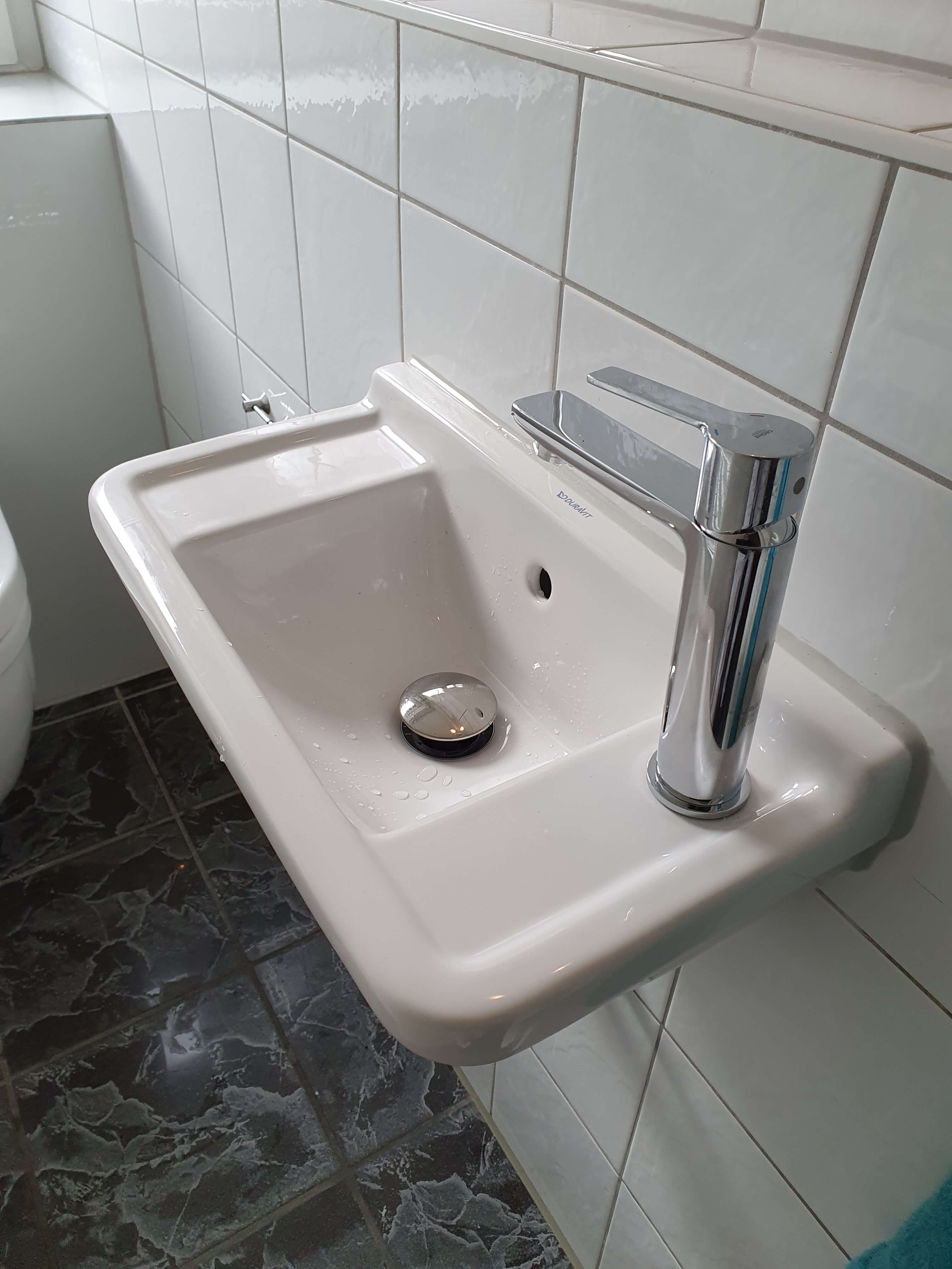 Gäste-Bad Teilsanierung in Neukirchen-Vluyn – Nachher Bild 1