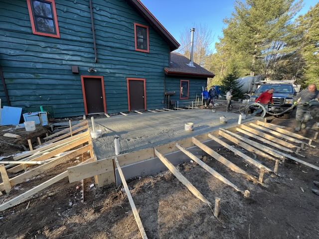 The foundation being poured in the early stages of the project.