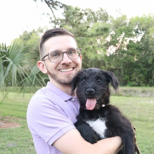 Headshot of Dr. Sal Colombo with dog