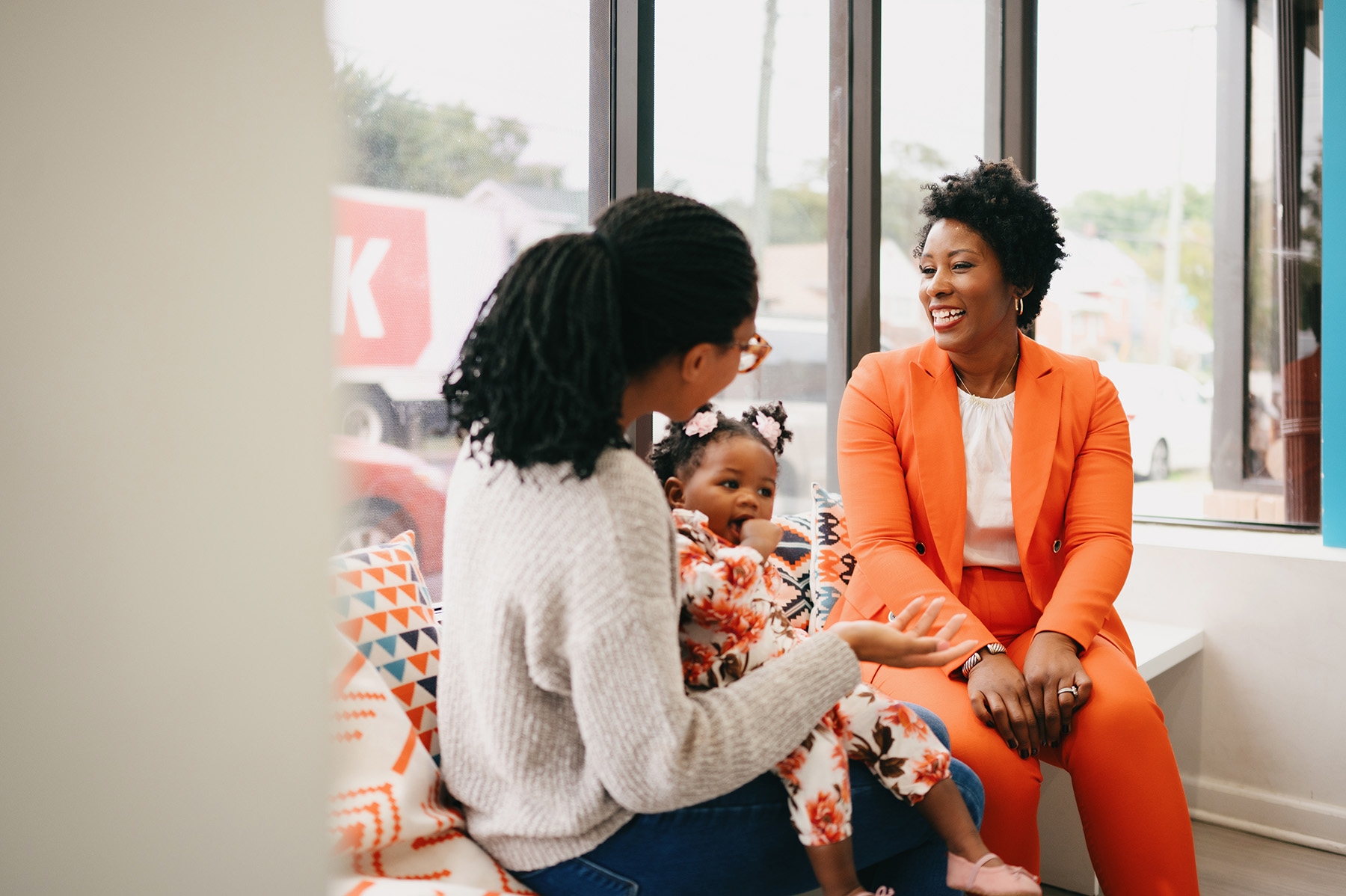 Photo of Dr. Mostowfi, a teenage patient, and her mother