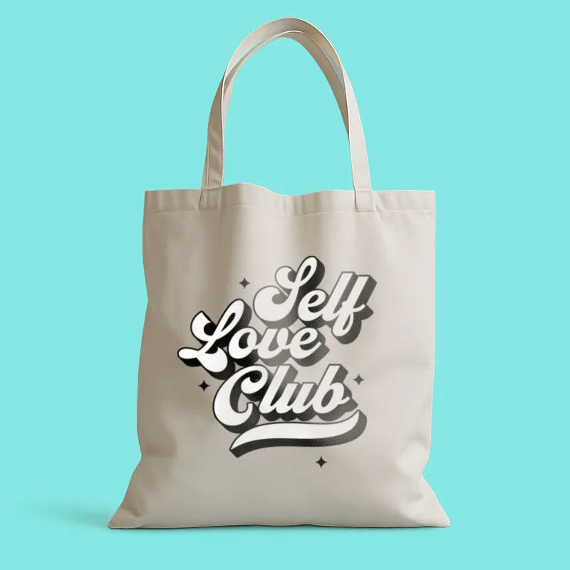 A tote bag with the words let love club printed on it.