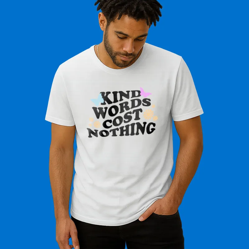A man wearing a white t - shirt that says kind words cost nothing.