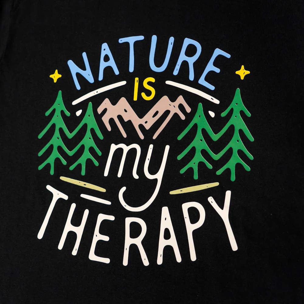 Graphic with text 'Nature is my therapy' surrounded by mountains, pine trees, and stars on black background.