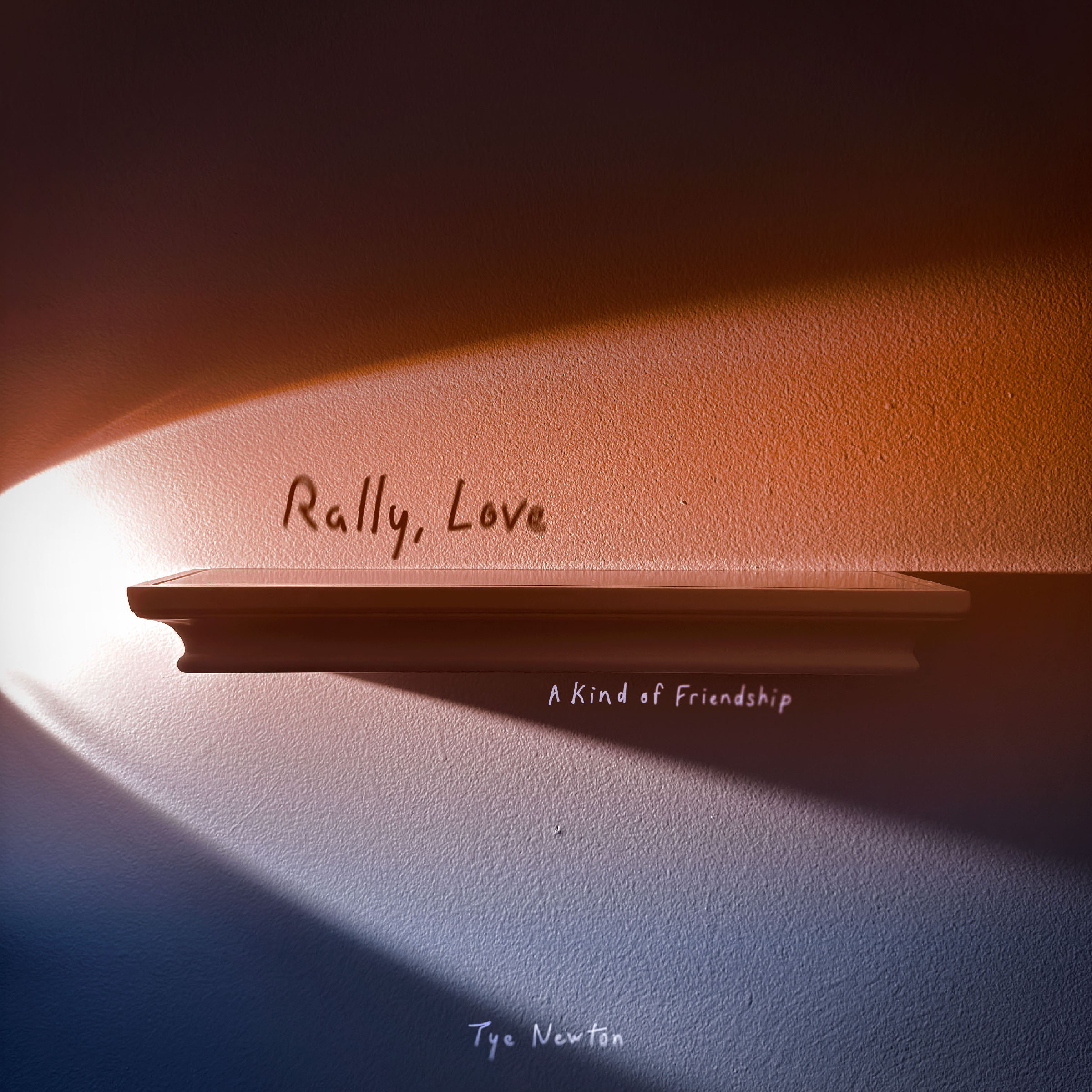 Music-single art: An empty, wall-mounted shelf, splitting a single beam from its left edge into red-orange light above and blue-indigo light below. Translucent, semi-blurred handwriting reads “Rally, Love (A Kind of Friendship)” and “Tye Newton”