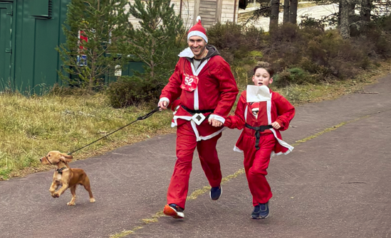 world record attempt, 25th September, 12-8pm, at Chill factor white heading on blue background on left of image. To the right is a male skier on a monoski wearing a green helmet. At the bottom of the image there is heading with blue text on a white background stating "Greatest distance skied by a team of seated skiers"