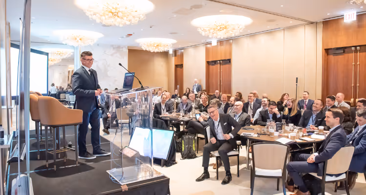 Photograph of the audience and speakers present at the Digital Wealth Summit in Chicago 2019