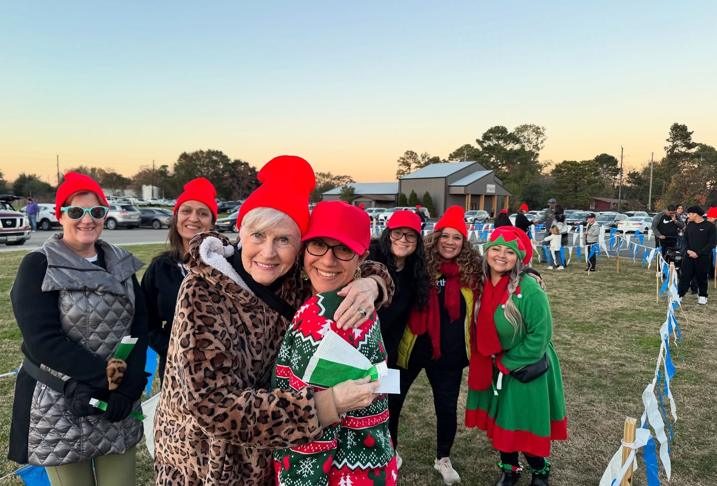 Family taking photos with Santa