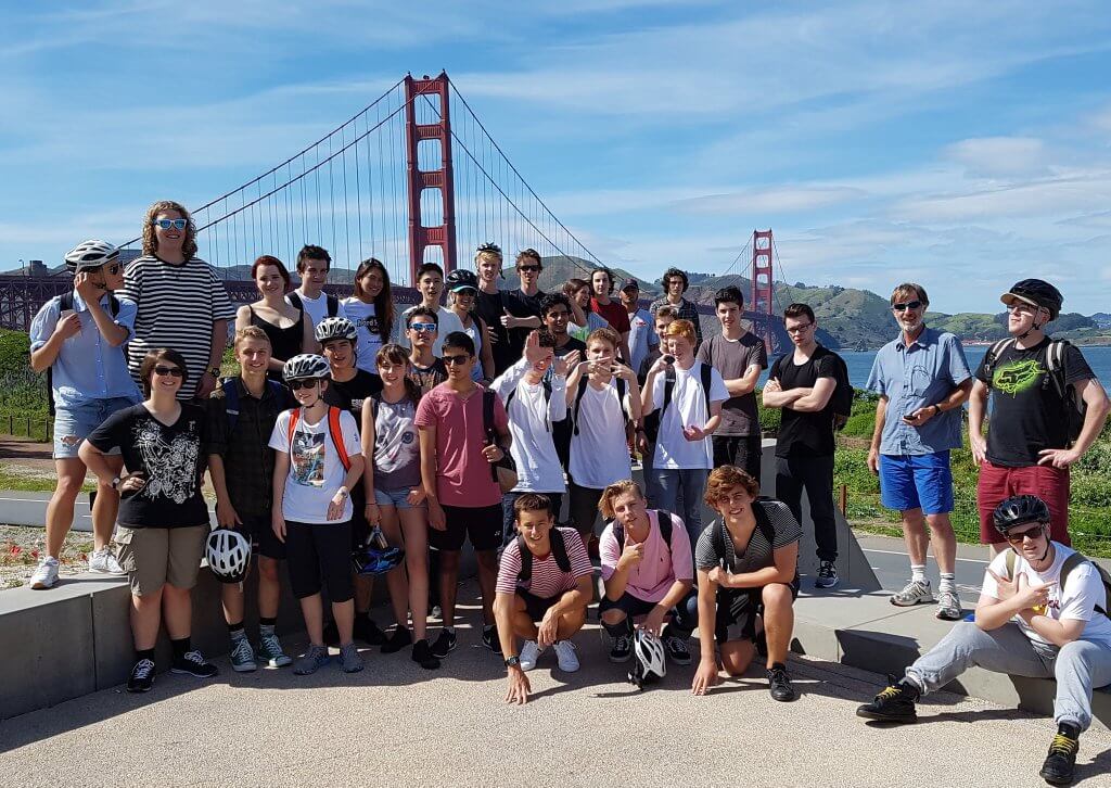 Your school can experience educational tours in USA with Educating Adventures, students in front of San Francisco Golden Gate Bridge on a school trip