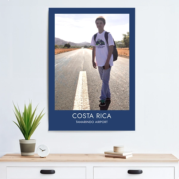 Travel poster of Costa Rica displayed on an apartment wall