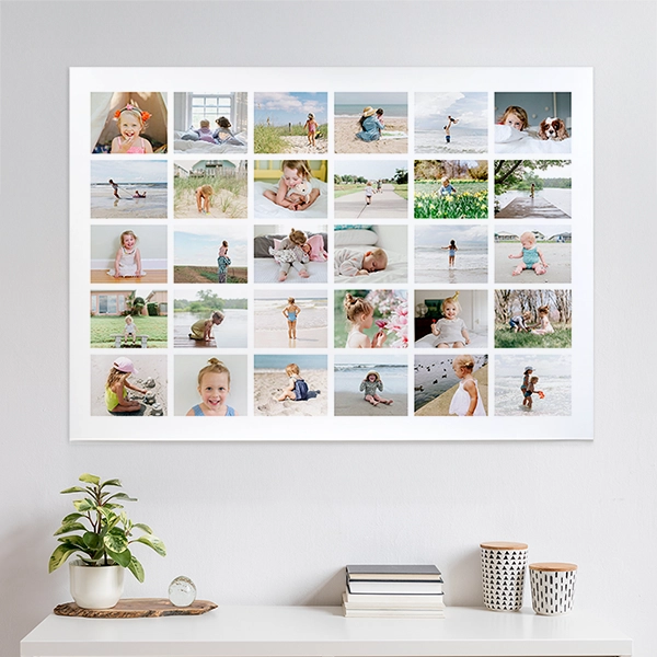 Black and white wedding photo poster displayed on a living room wall