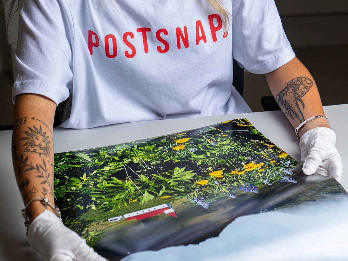 Family looking at photo prints at home