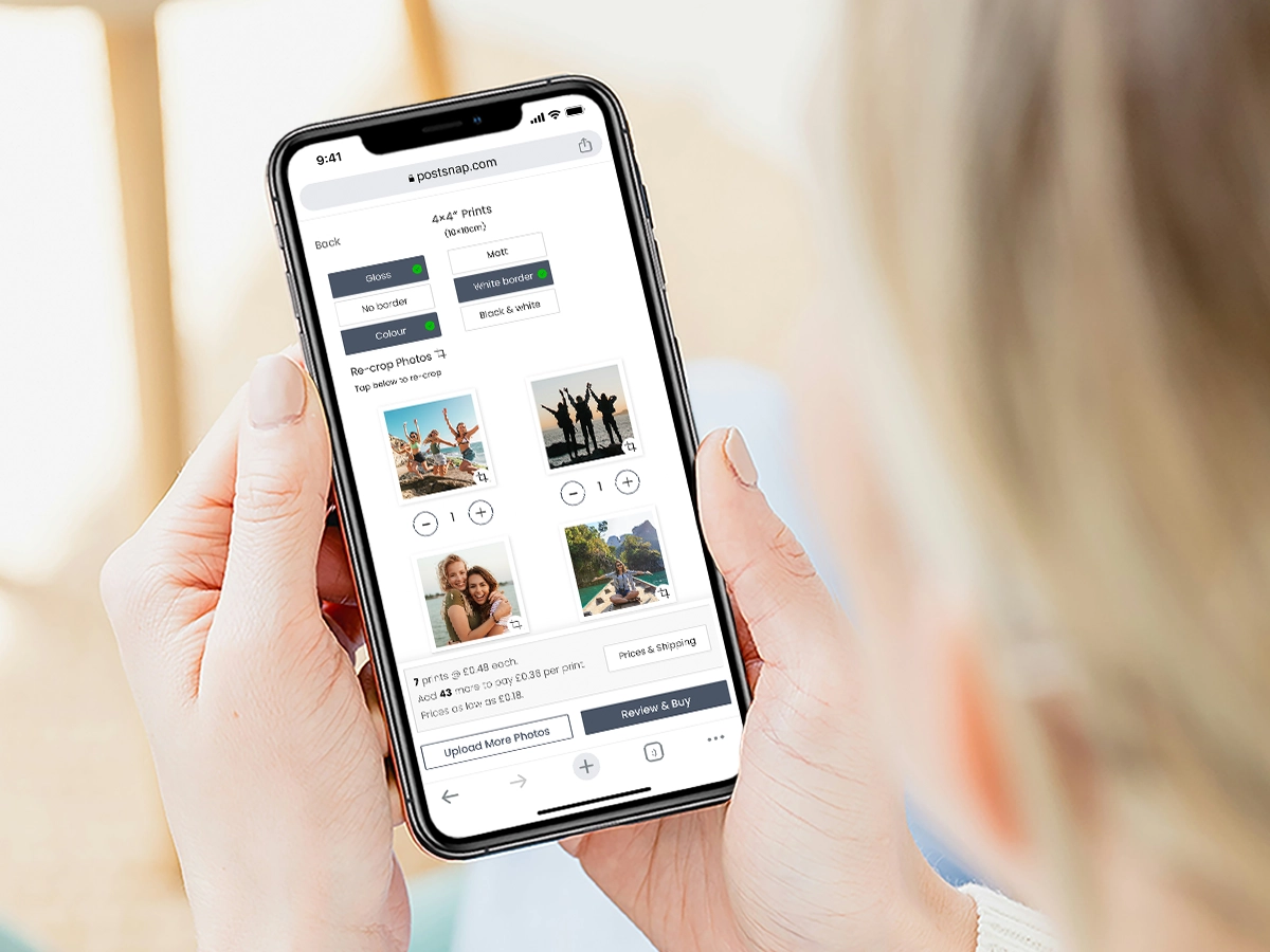 Screenshot of the Postsnap website on an iPhone, displaying options for selecting photos and customising prints.