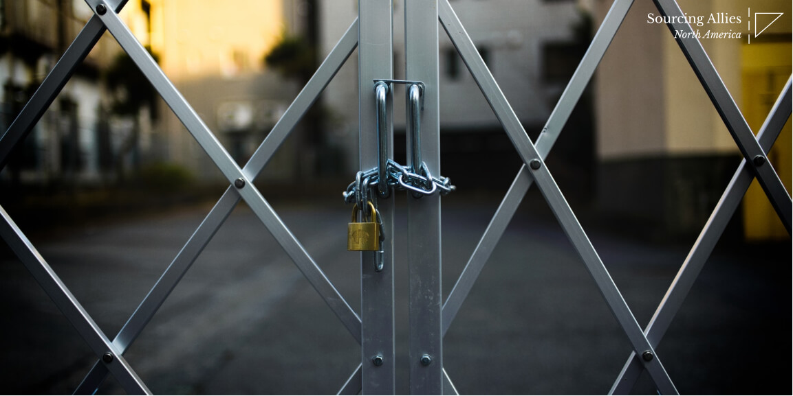 Strategic China sourcing - Padlock on gate