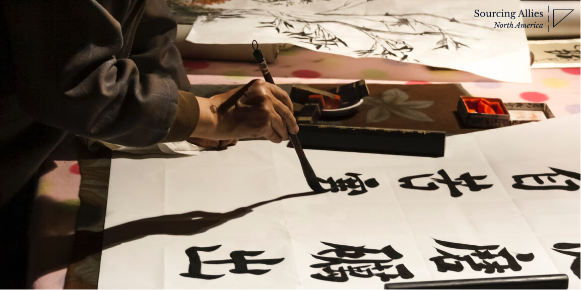 China supply chain - Man writing Chinese characters