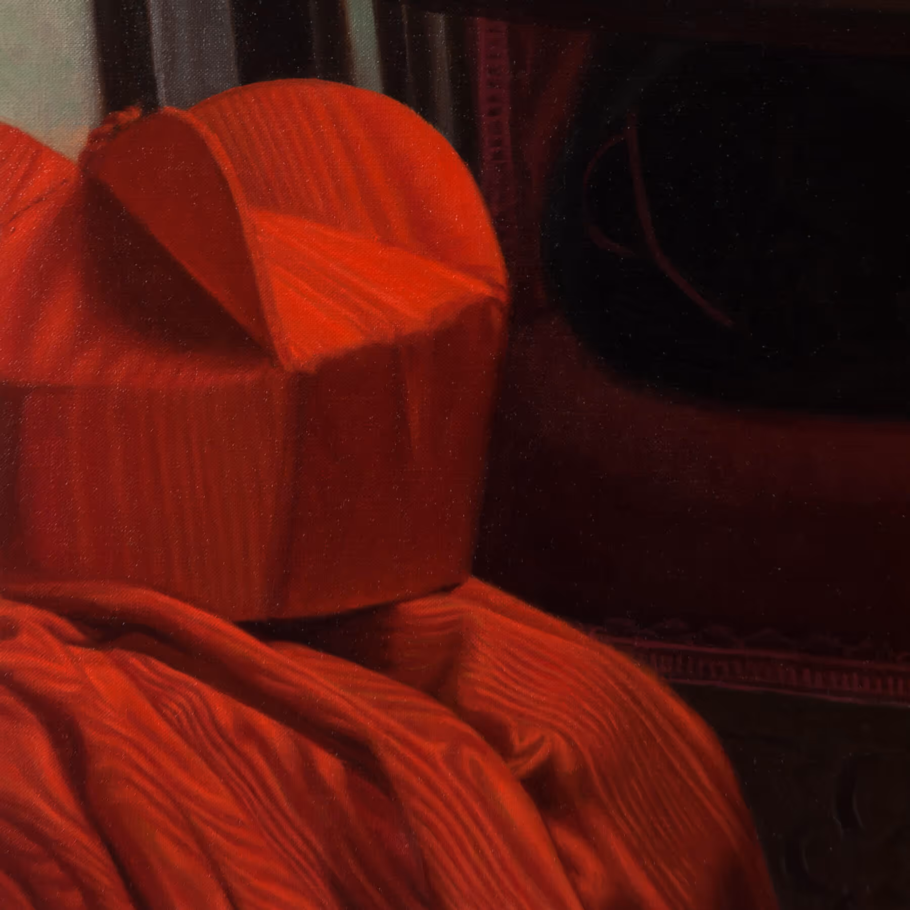 Detail of official clergy portrait showing the red cardinal's hat and ceremonial vestments.