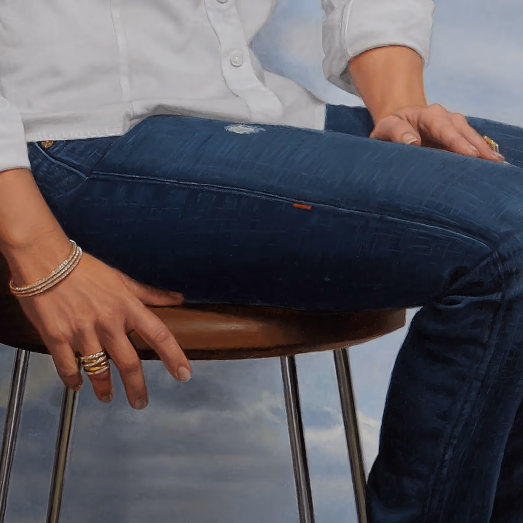 Detail of Jennifer’s hands, jewelry, and seated pose in a contemporary portrait by Marvin Mattelson.
