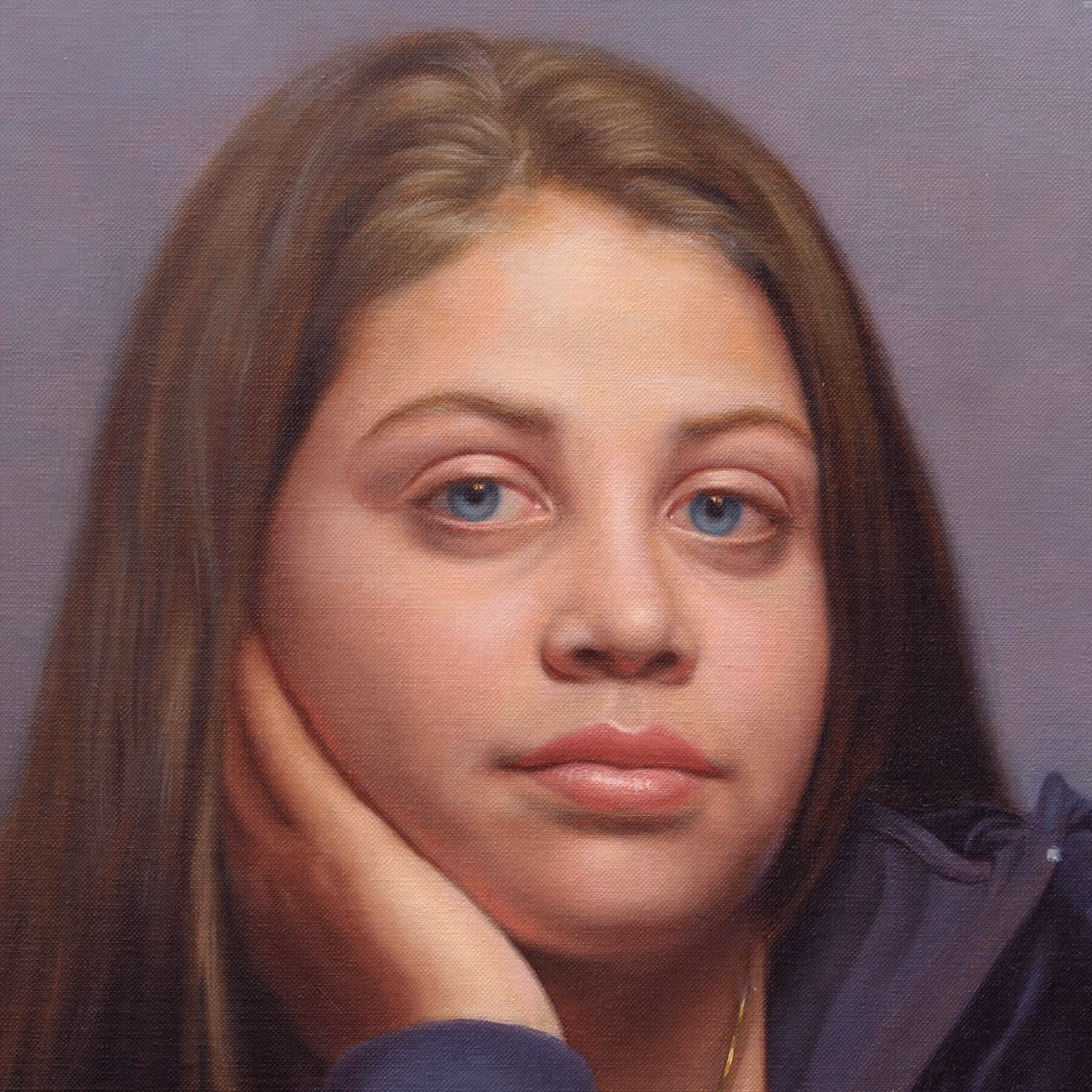 Close-up detail of Sydnie’s face showing blue eyes, expression, and softly modeled flesh tones in a portrait by Marvin Mattelson.