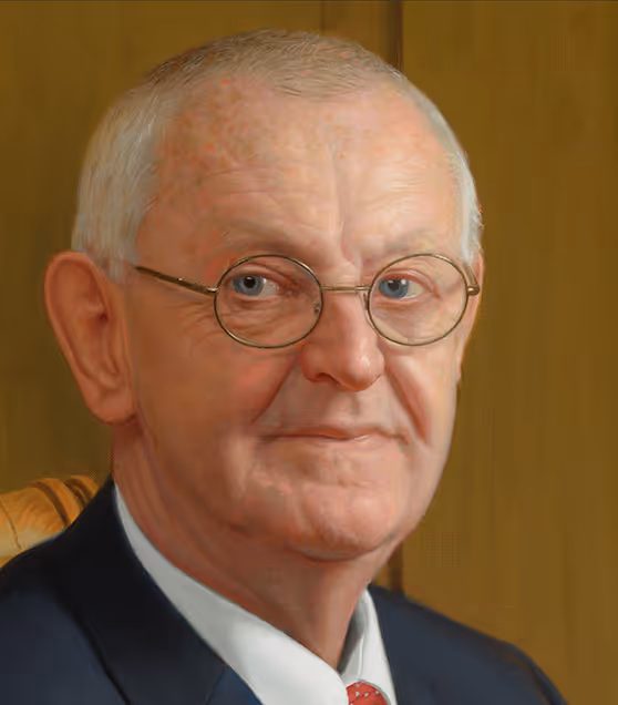 Head-and-shoulders detail of Wil de Hollander in an executive portrait by Marvin Mattelson.