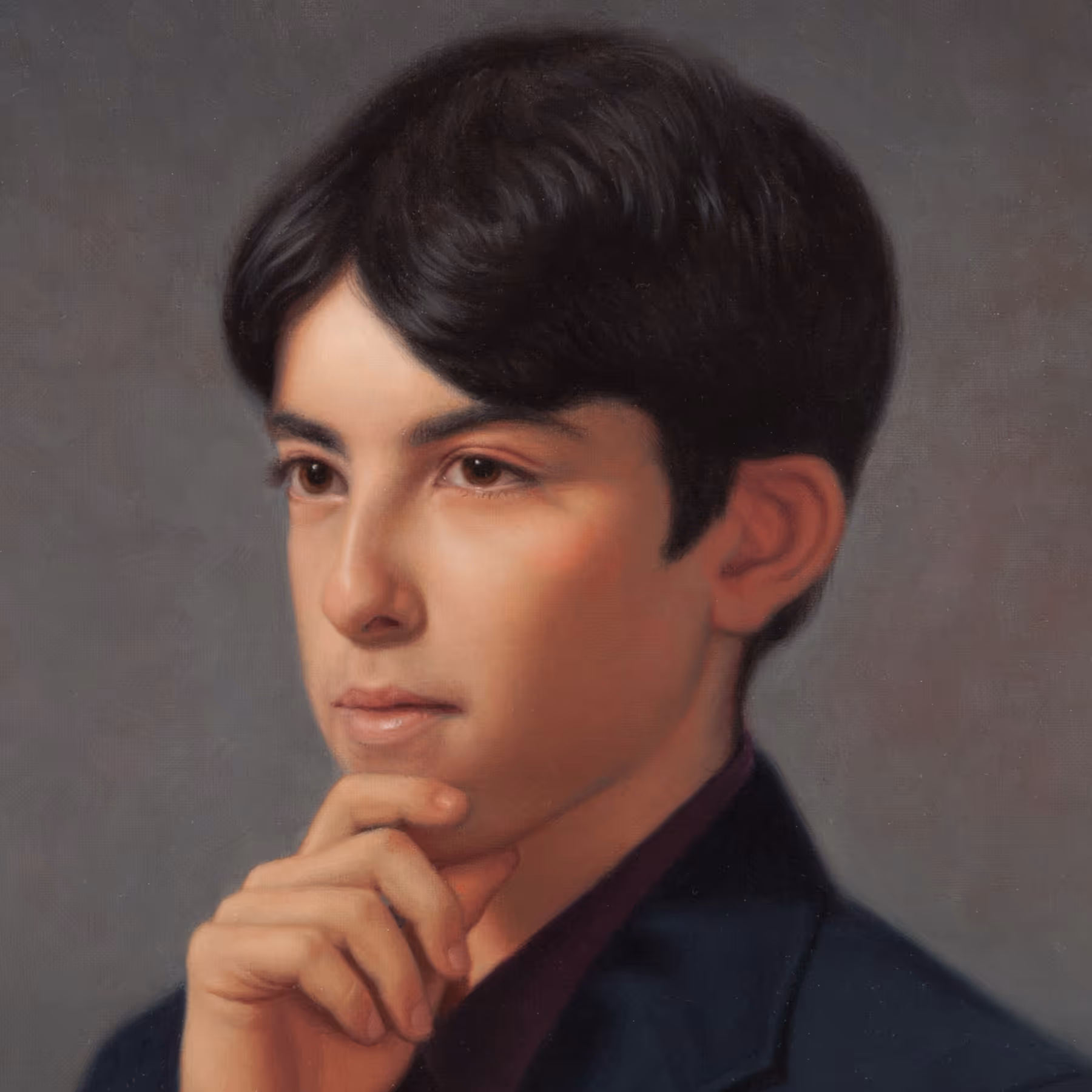Portrait detail of Michael showing facial features, expression, and softly illuminated flesh tones.