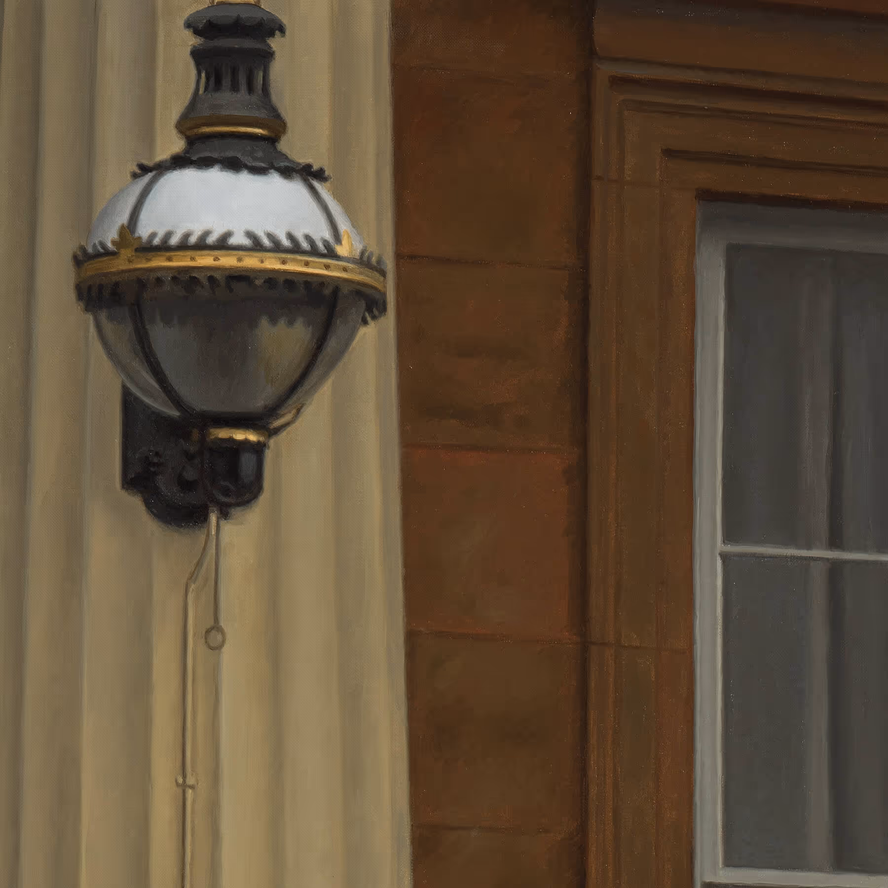 Architectural detail of Buckingham Palace showing decorative sconce, columns, and surrounding stonework.