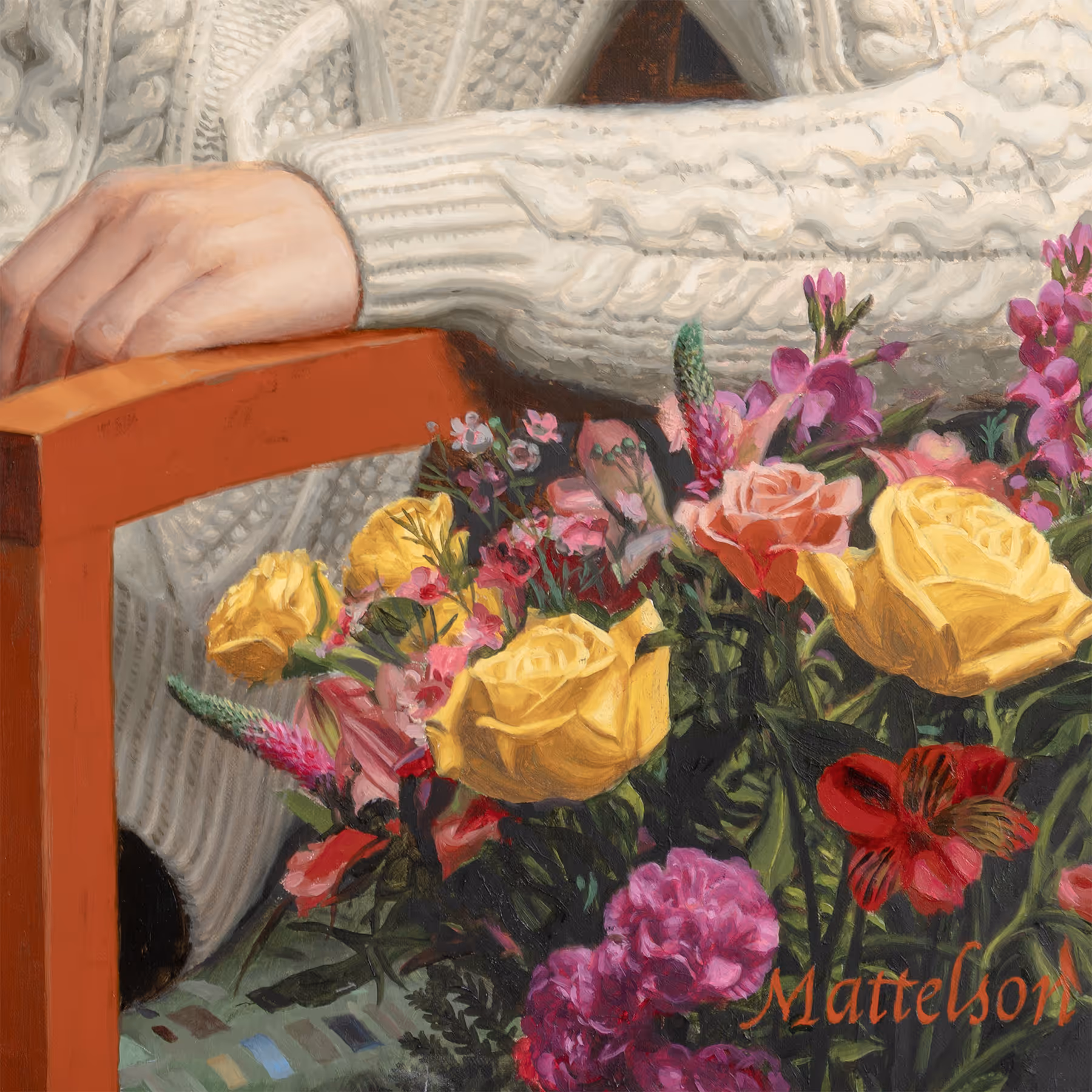 Detail of Jackie Laskoff’s hand, floral arrangement, and yellow roses symbolizing remembrance and enduring love.