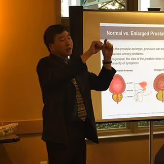 dr. paul jo making a professional presentation