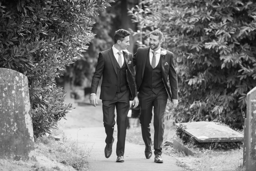 Glen Yr Afon wedding groom and best man walking to Church