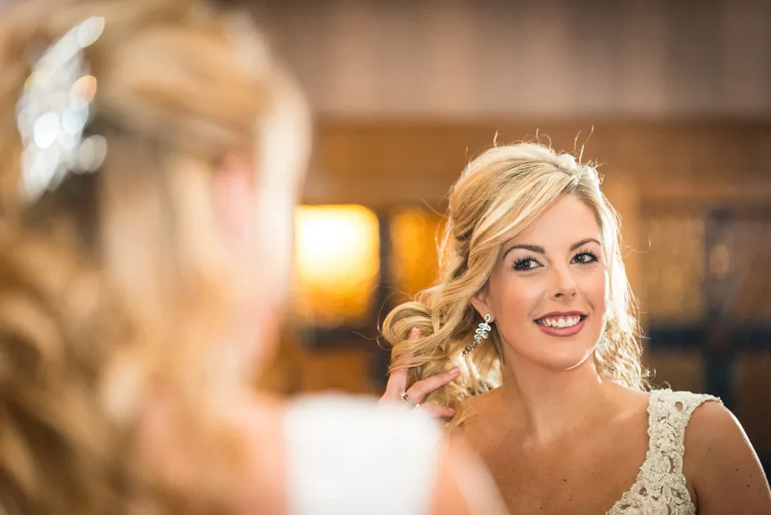 Glen Yr Afon wedding bride looking in mirror