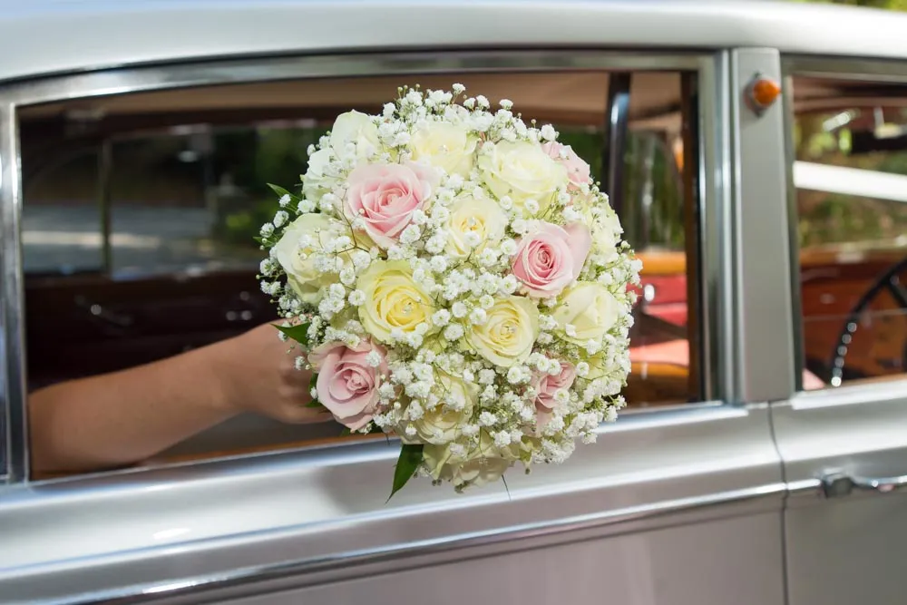 Glen Yr Afon wedding bouquet out of car window