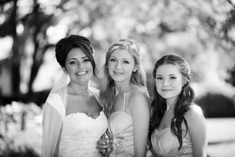 Glen Yr Afon wedding bride, mother and sister n lawn