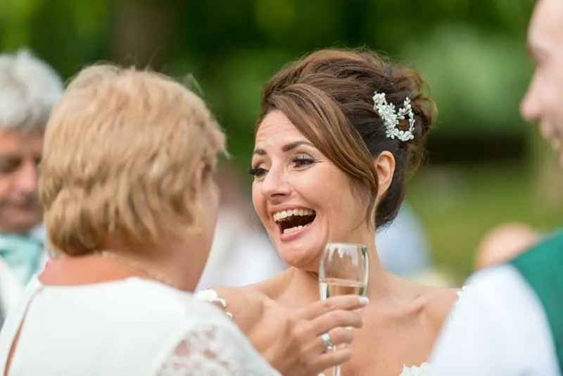Glen Yr Afon wedding bride laughing