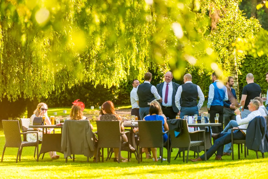 Glen Yr Afon wedding guests on lawn