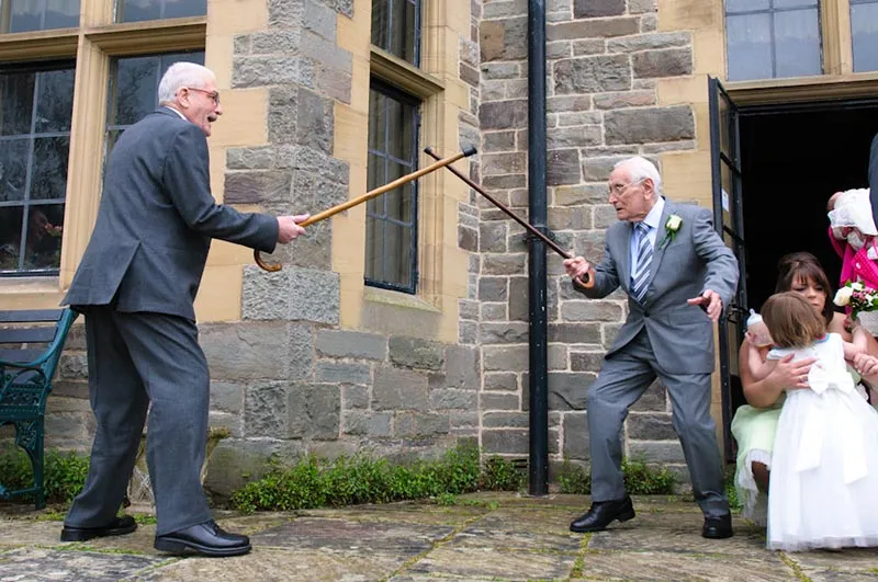 Llangoed hall wedding elderly gentlemen playing