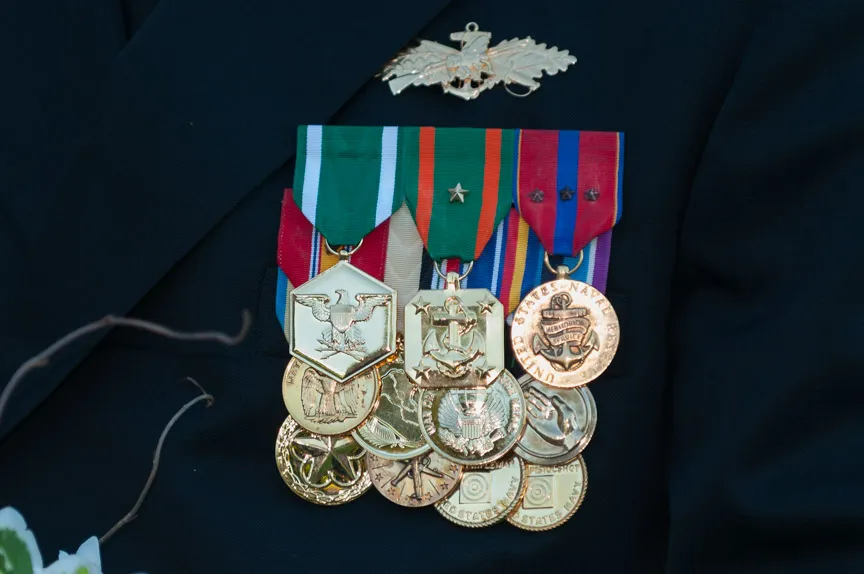 Llangoed hall wedding groom's medals
