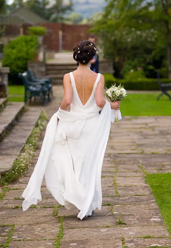 Llangoed hall wedding bride walking
