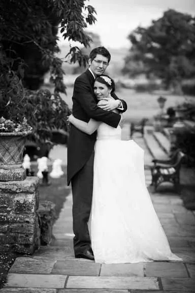 Llangoed hall wedding couple hugging