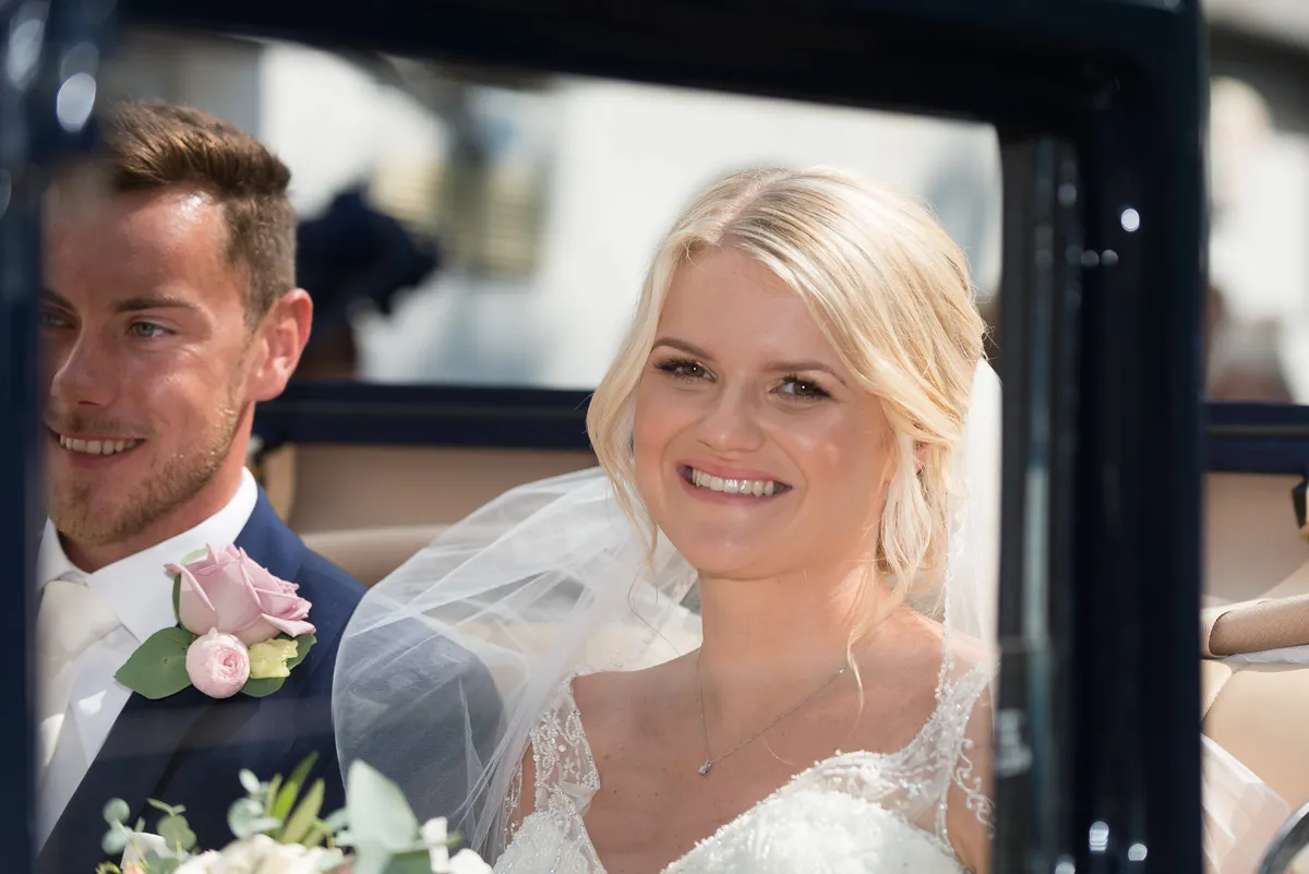Glen Yr Afon wedding bride in open top car