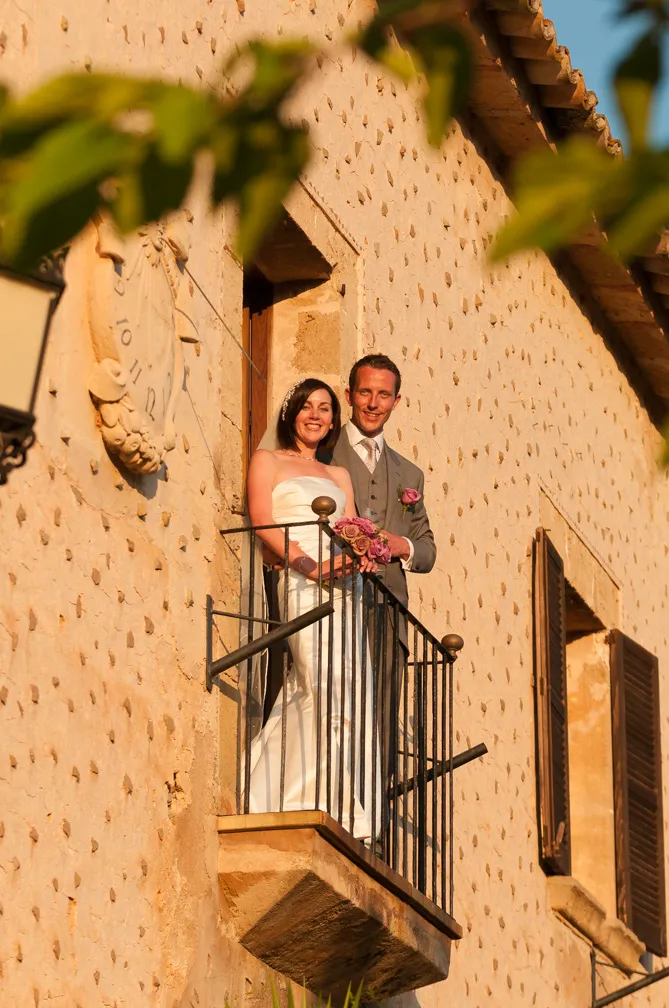 Bride & Groom on balcony in golden hour Majorca