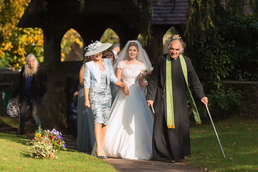 St Tewdrics House wedding bride walking to church