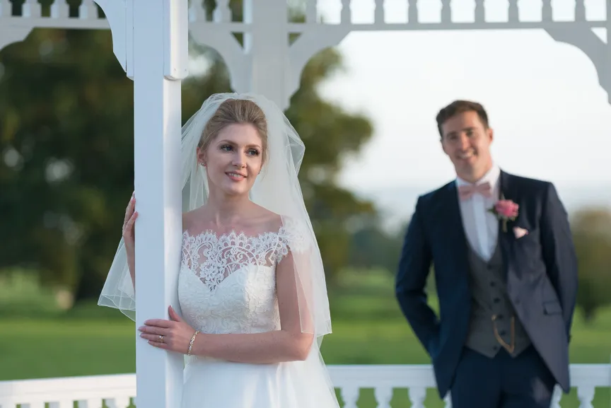 St Tewdrics House wedding bride and groom in pergolaa