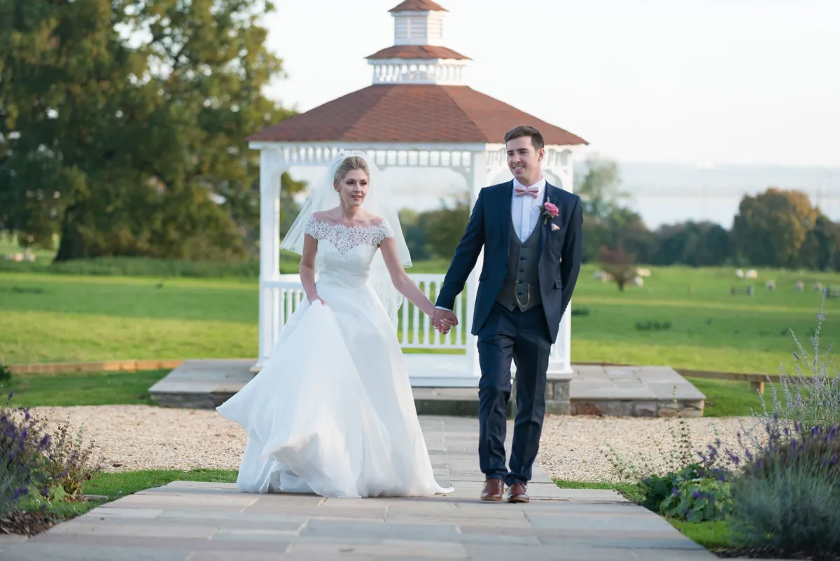 St Tewdrics House wedding bride & groom walking up path