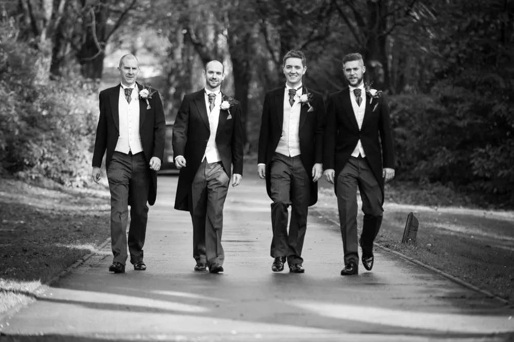 Pencoed House winter wedding groom walking