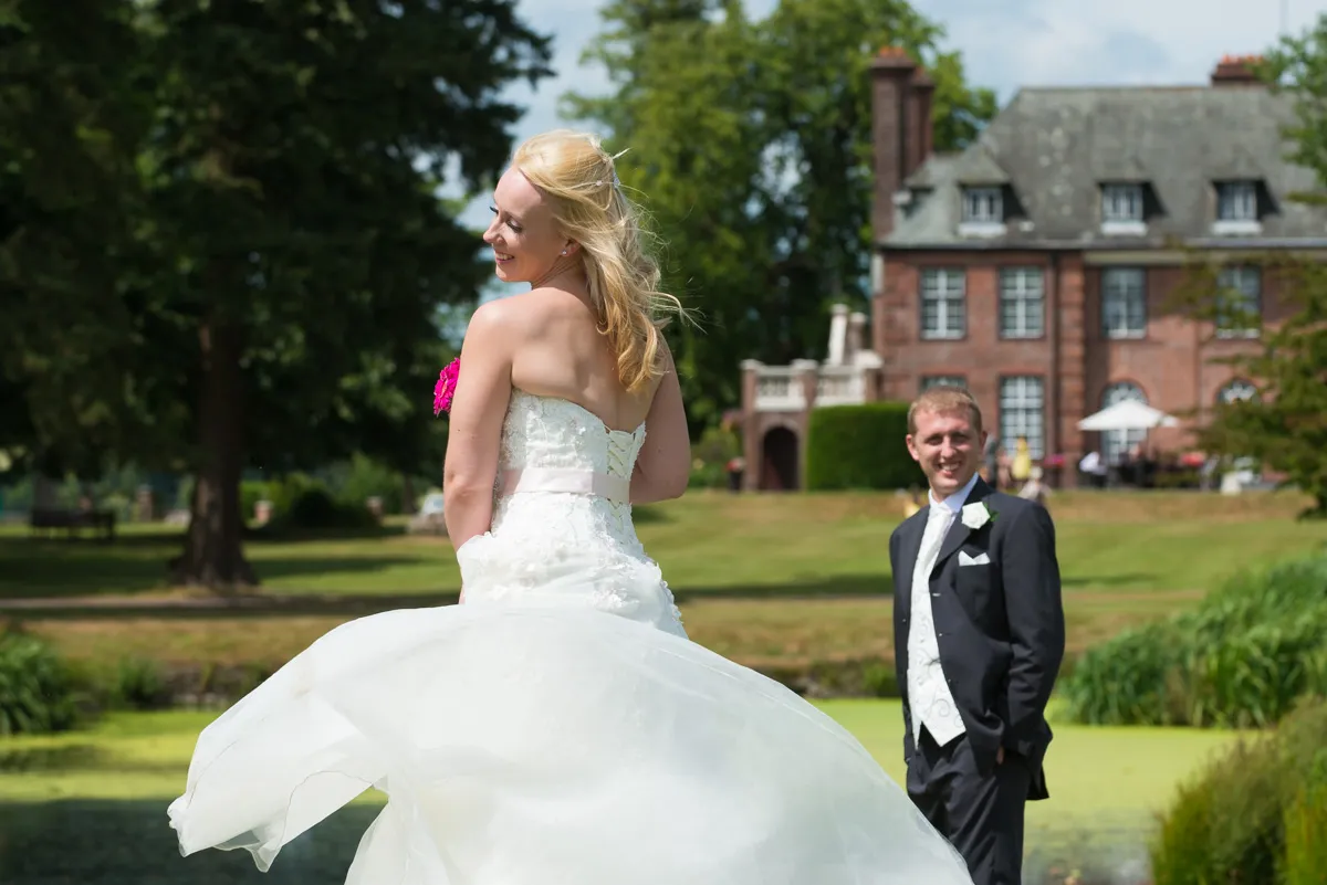Bride and groom dancing  in the gardens of Sant Ffraed House, Abergavenny