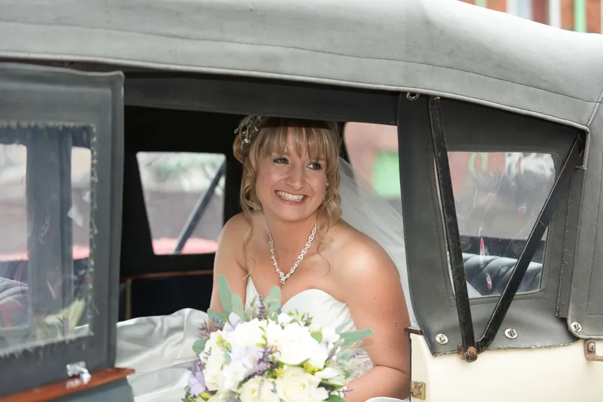 Bride in car Greenmeadow Golf Club, Cwmbran