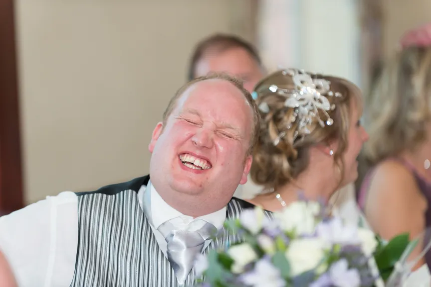 groom laughing Greenmeadow Golf Club, Cwmbran