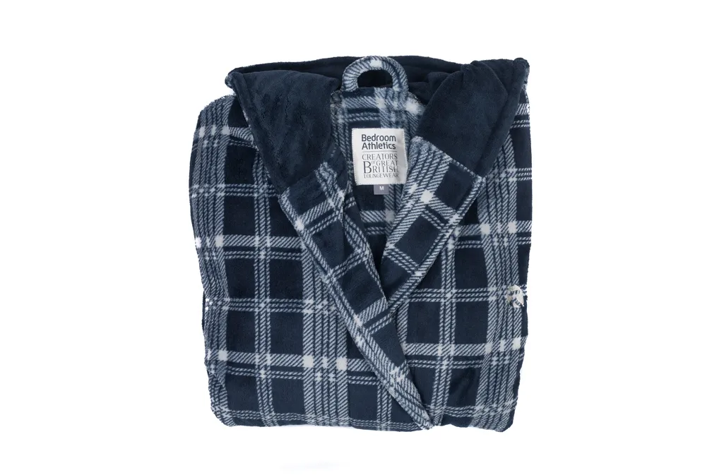 Folded navy blue and white checkered bathrobe with a hood and a Bedroom Athletics label.