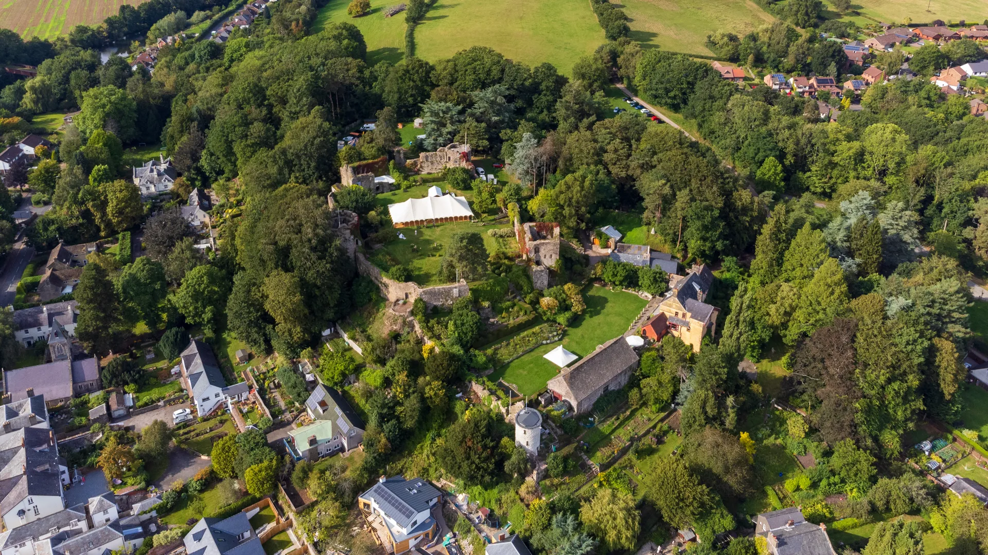 drone photo of wedding at Usk Castle in Summer