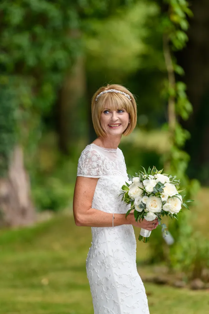 Glen Yr Afon wedding bride in garden