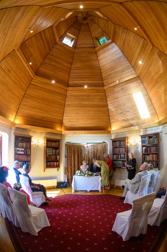 Glen Yr Afon wedding signing register in library